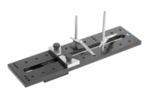 Piastre di staffaggio in alluminio con tendimolle / pressore e prismi Piastre di staffaggio in alluminio con tendimolle / pressore e prismi